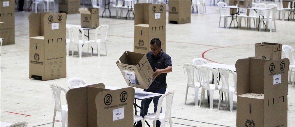 Οι Κολομβιανοί προσέρχονται στις κάλπες την ώρα που το χειρότερο ξέσπασμα βίας από το 2016 μαστίζει τη χώρα